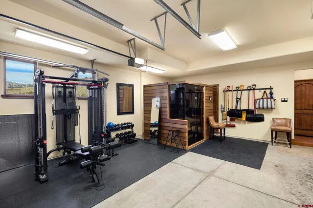 a view of game room with gym equipment