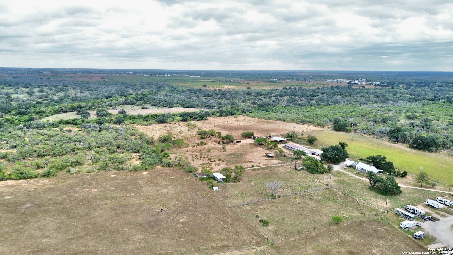 2880 2nd Street Pleasanton, TX 78064 - Photo 28 of 32 an aerial view of a city with lots of residential buildings