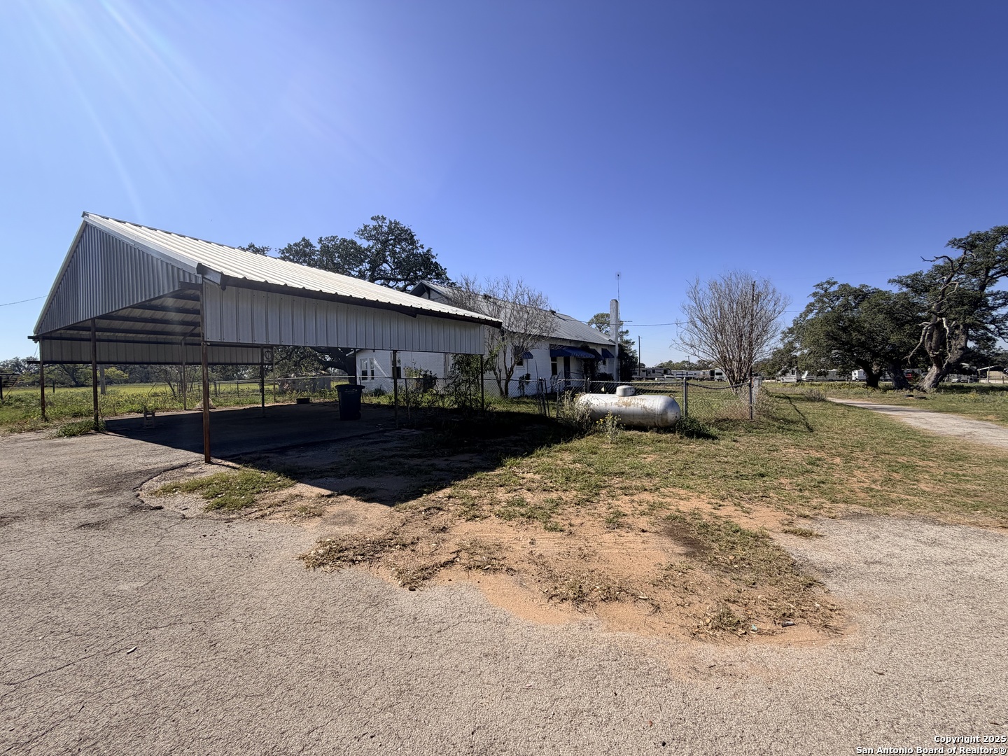2880 2nd Street Pleasanton, TX 78064 - Photo 6 of 32 a view of a house with backyard and sitting area