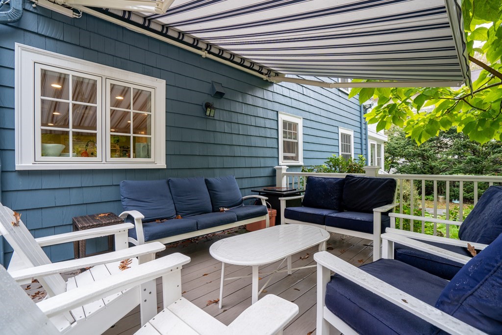 32 Verndale Road Newton, MA 02461 - Photo 24 of 33 a view of a patio with a table chairs and a potted plant