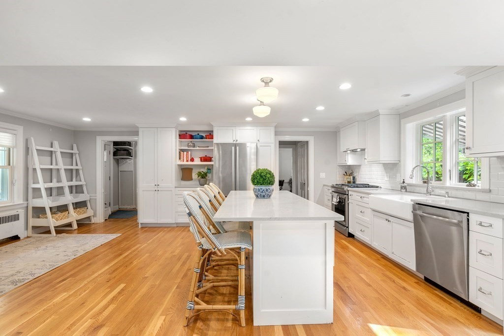 32 Verndale Road Newton, MA 02461 - Photo 7 of 33 a large white kitchen with lots of counter top space and a sink
