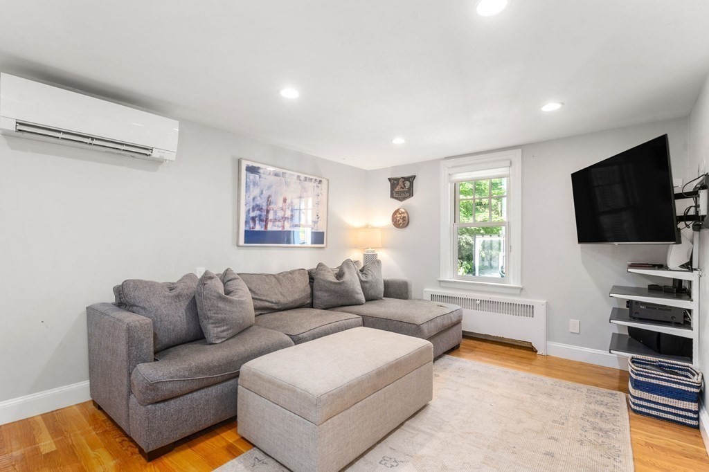 32 Verndale Road Newton, MA 02461 - Photo 9 of 33 a living room with furniture and a flat screen tv