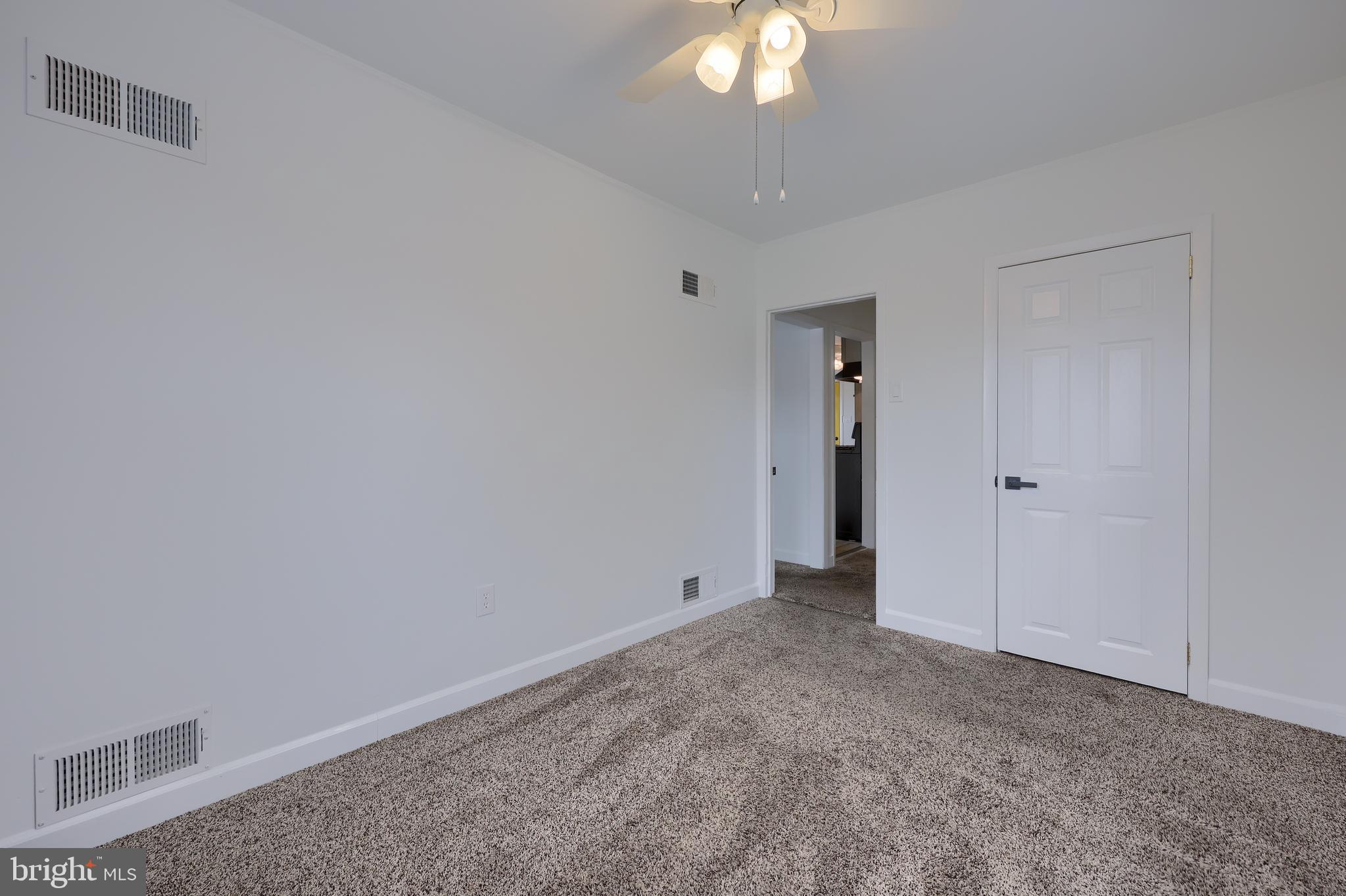 1802 Filbert Street York, PA 17404 - Photo 11 of 30 a view of an empty room with a chandelier fan