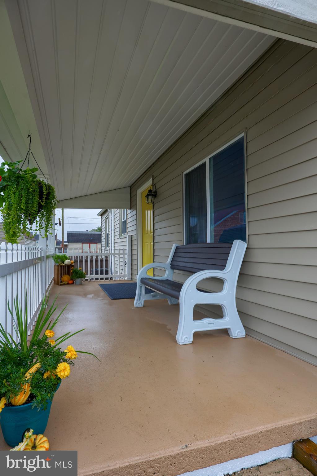 1802 Filbert Street York, PA 17404 - Photo 28 of 30 a view of a patio with table and chairs and potted plants