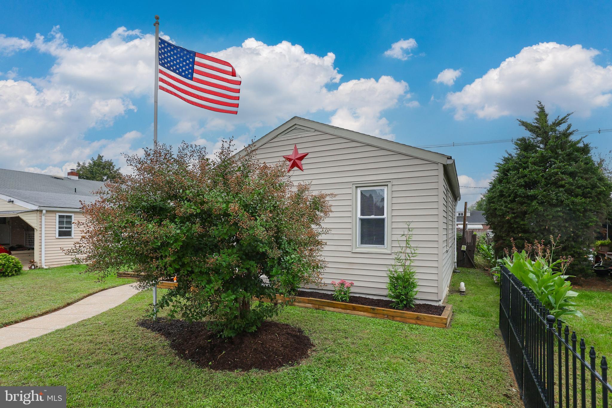 1802 Filbert Street York, PA 17404 - Photo 30 of 30 a front view of a house with a yard