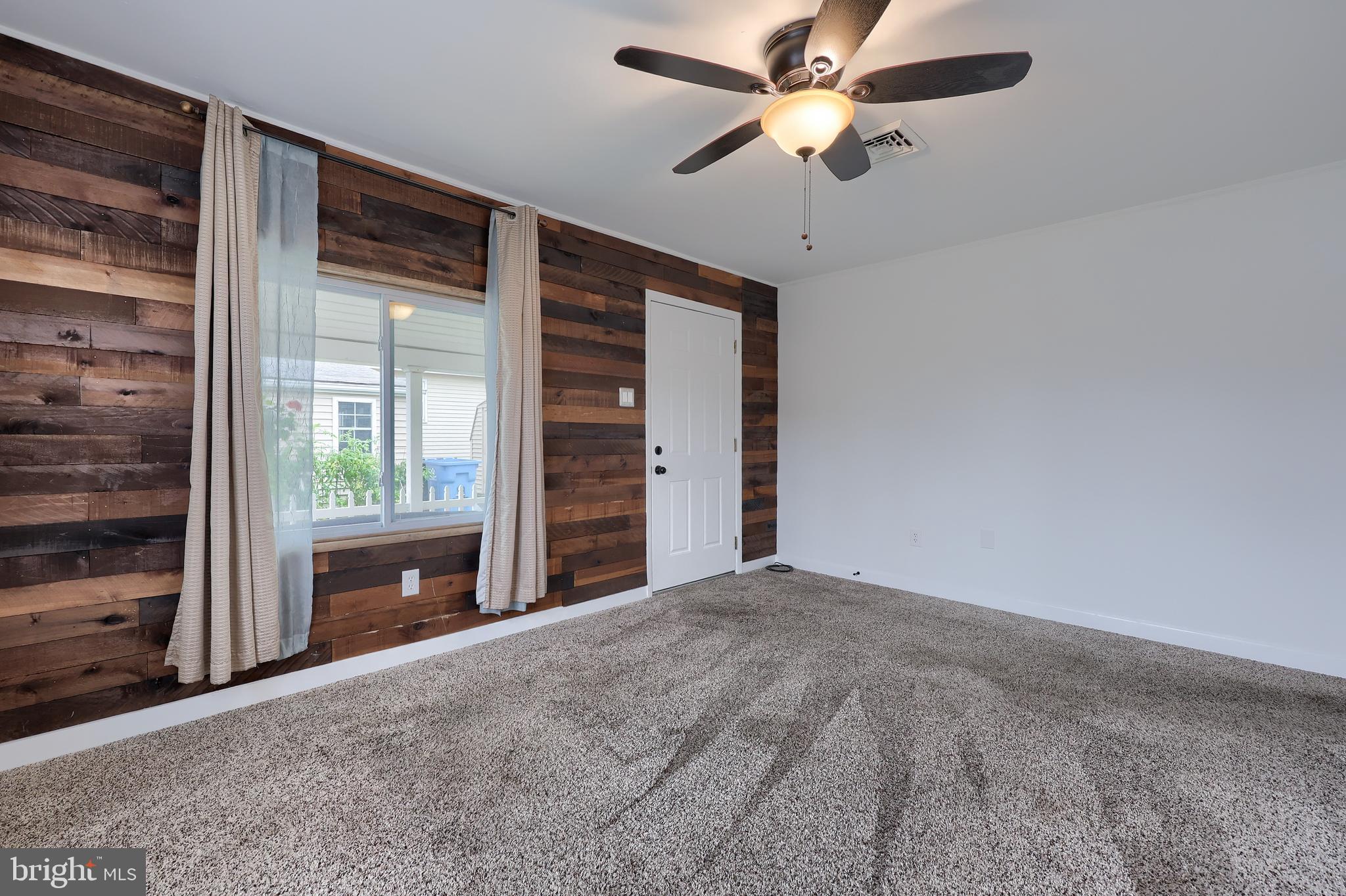 1802 Filbert Street York, PA 17404 - Photo 6 of 30 a view of room with ceiling fan and window