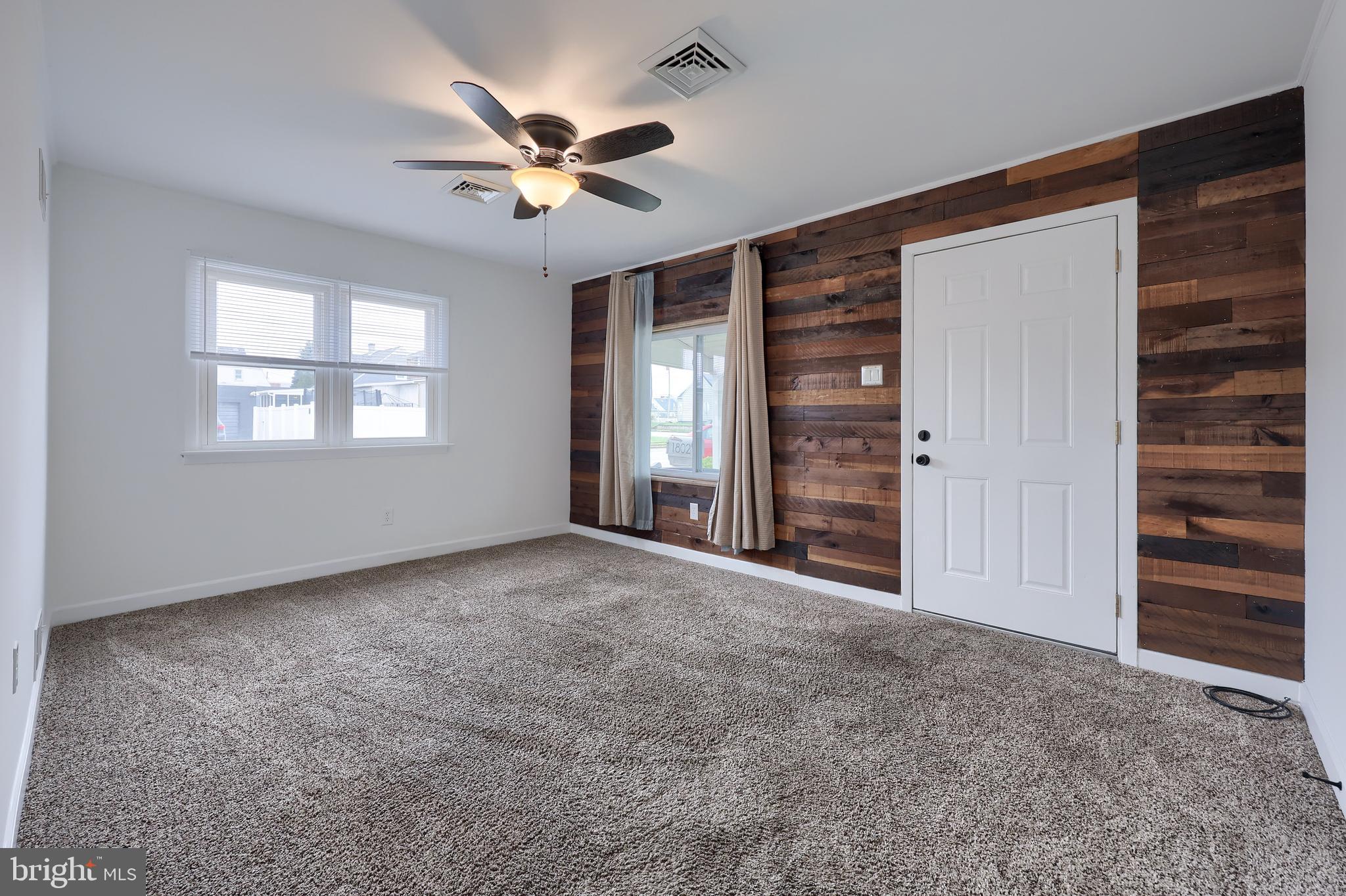 1802 Filbert Street York, PA 17404 - Photo 7 of 30 a view of an empty room with a window