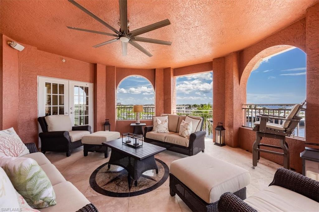 451 Bayfront Place, Unit 5407 Naples, FL 34102 - Photo 11 of 21 a living room with furniture and a large window
