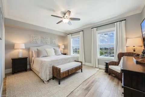 a bedroom with a bed and furniture