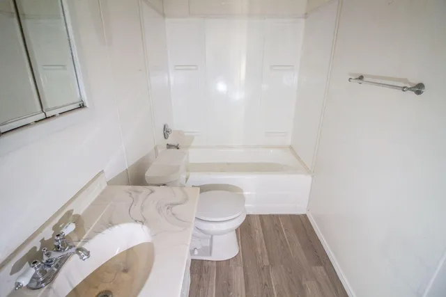 a bathroom with a sink and a toilet