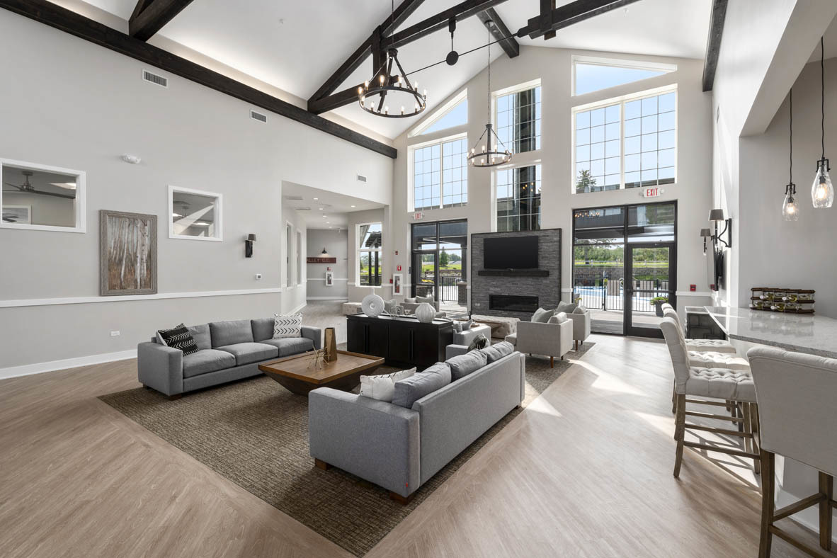 303 Ridley Street North Aurora, IL 60542 - Photo 17 of 36 a living room with furniture or fireplace and a flat screen tv