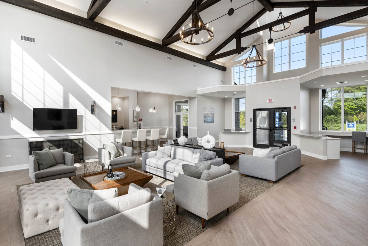 303 Ridley Street North Aurora, IL 60542 - Photo 21 of 36 a living room with fireplace furniture and a flat screen tv