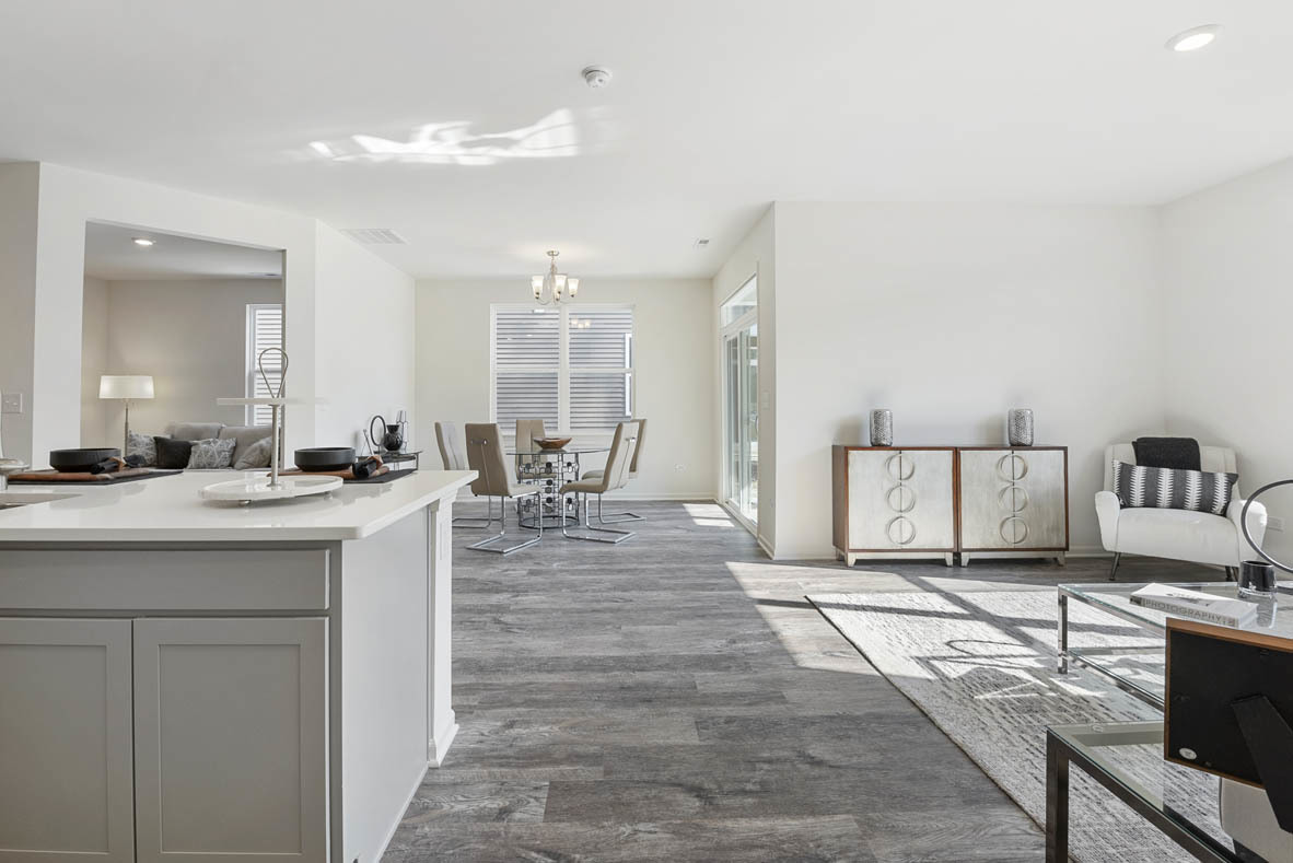 303 Ridley Street North Aurora, IL 60542 - Photo 5 of 36 a view of living room with granite countertop furniture and fireplace