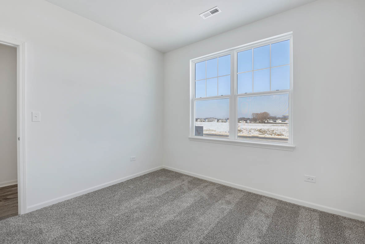 303 Ridley Street North Aurora, IL 60542 - Photo 7 of 36 a view of wooden floor