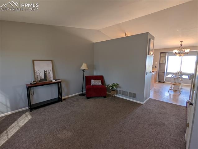 7655 Old Spec Road Peyton, CO 80831 - Photo 5 of 35 Generous sized living room.