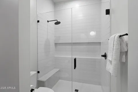 a bathroom with a sink a vanity and a mirror