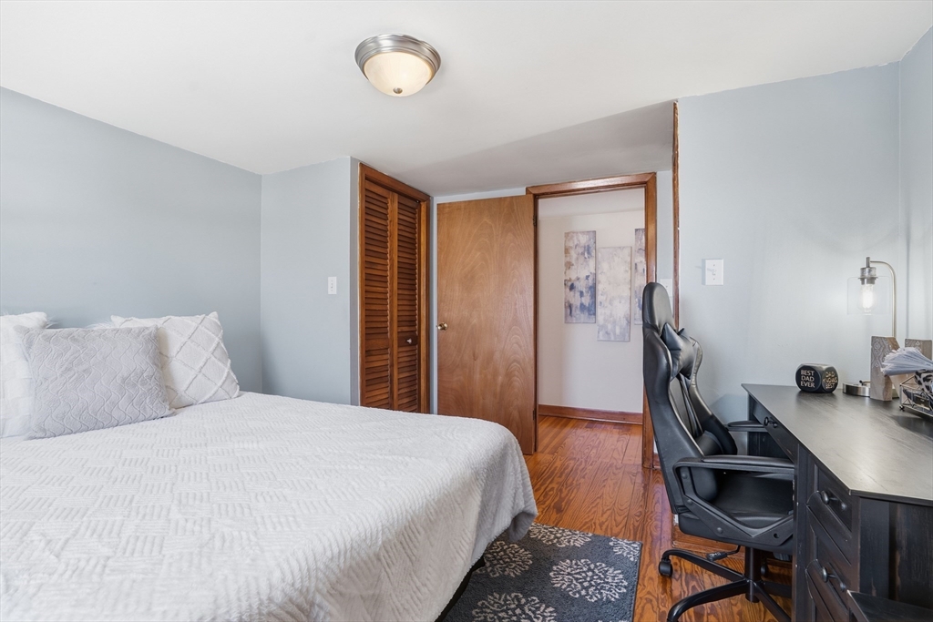60 Wingold Street Fall River, MA 02720 - Photo 24 of 40 a bedroom with a bed and a desk