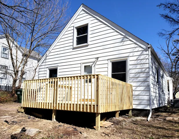 a view of an empty room with stairs