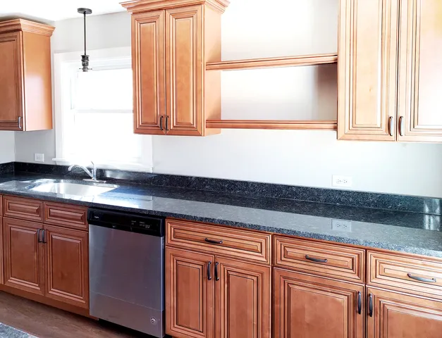 a view of a sink and a mirror