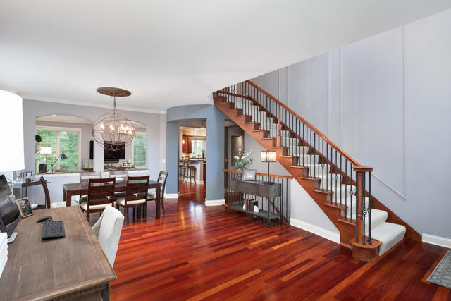 1731 Elyse Lane Naperville, IL 60565 - Photo 2 of 34 a living room with furniture dining table and wooden floor