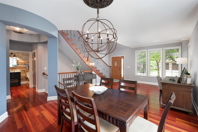1731 Elyse Lane Naperville, IL 60565 - Photo 4 of 34 a view of a dining room with furniture window and wooden floor