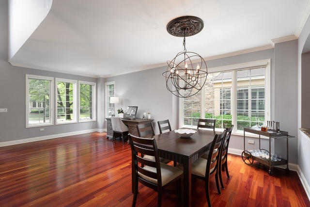 1731 Elyse Lane Naperville, IL 60565 - Photo 6 of 34 a view of a dining room with furniture window and wooden floor