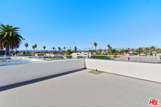 a view of swimming pool and city view