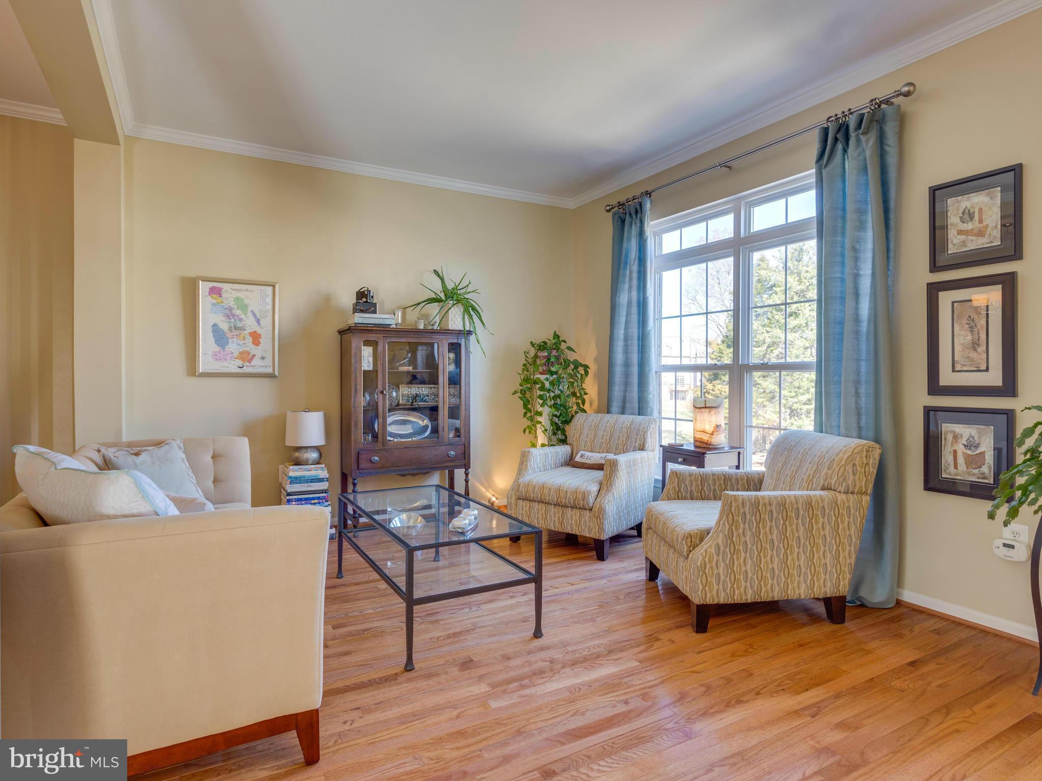 7310 Hampton Manor Place Springfield, VA 22150 - Photo 6 of 30 a living room with furniture and a window