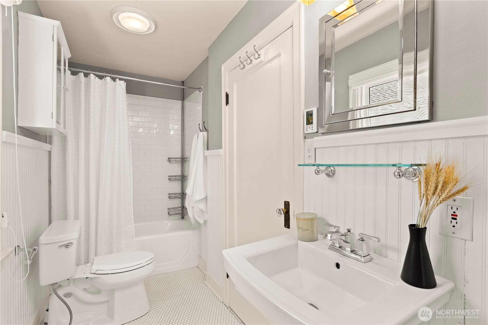 3617 East Cherry Street Seattle, WA 98122 - Photo 19 of 34 a bathroom with a sink toilet and shower