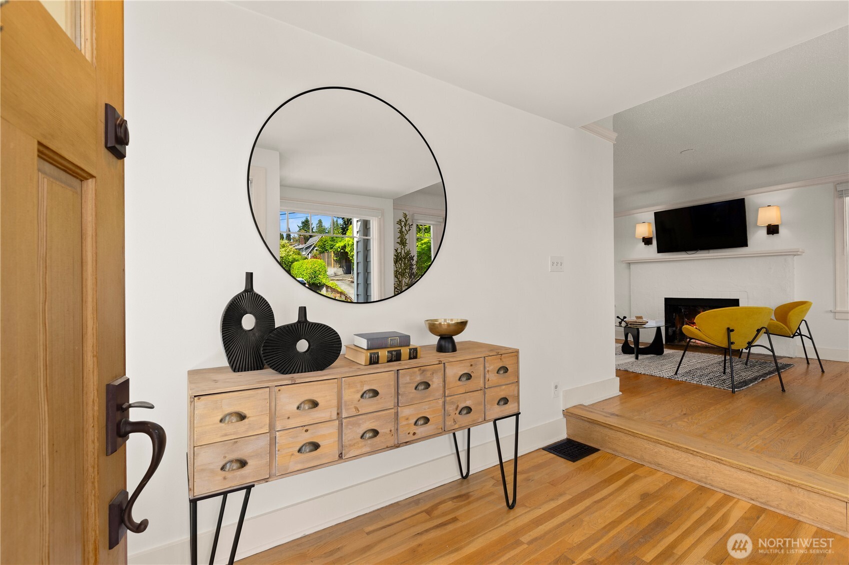 3617 East Cherry Street Seattle, WA 98122 - Photo 2 of 34 a living room with furniture and a mirror