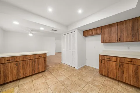 an empty room with a ocean view