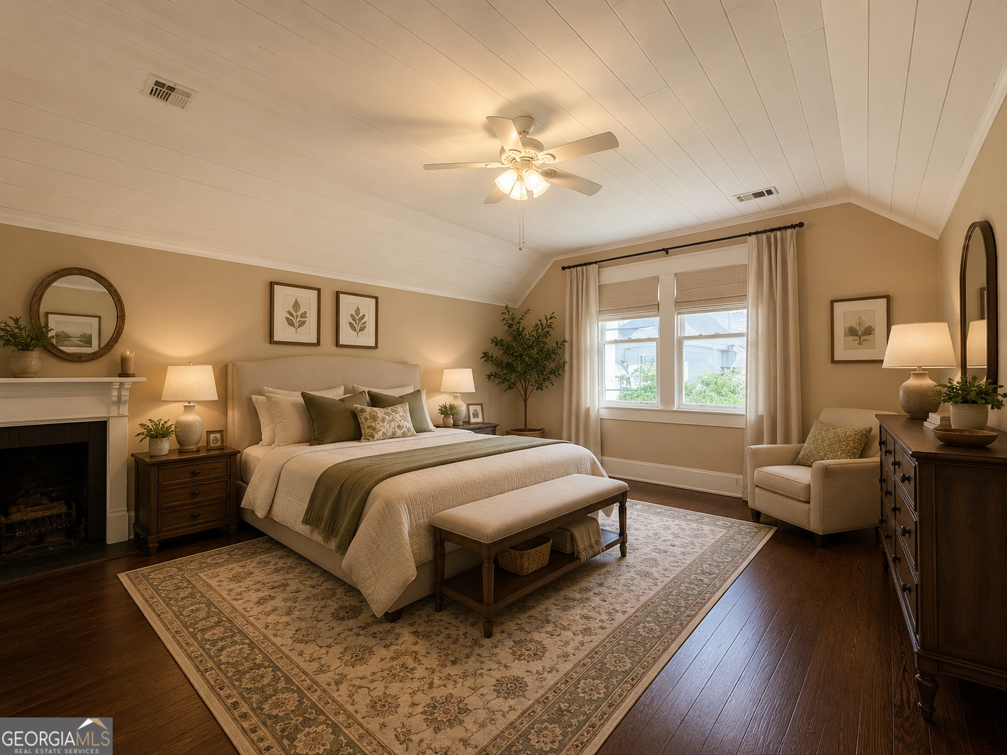 316 West Church Street Fort Valley, GA 31030 - Photo 26 of 28 a spacious bedroom with a large bed and a chandelier