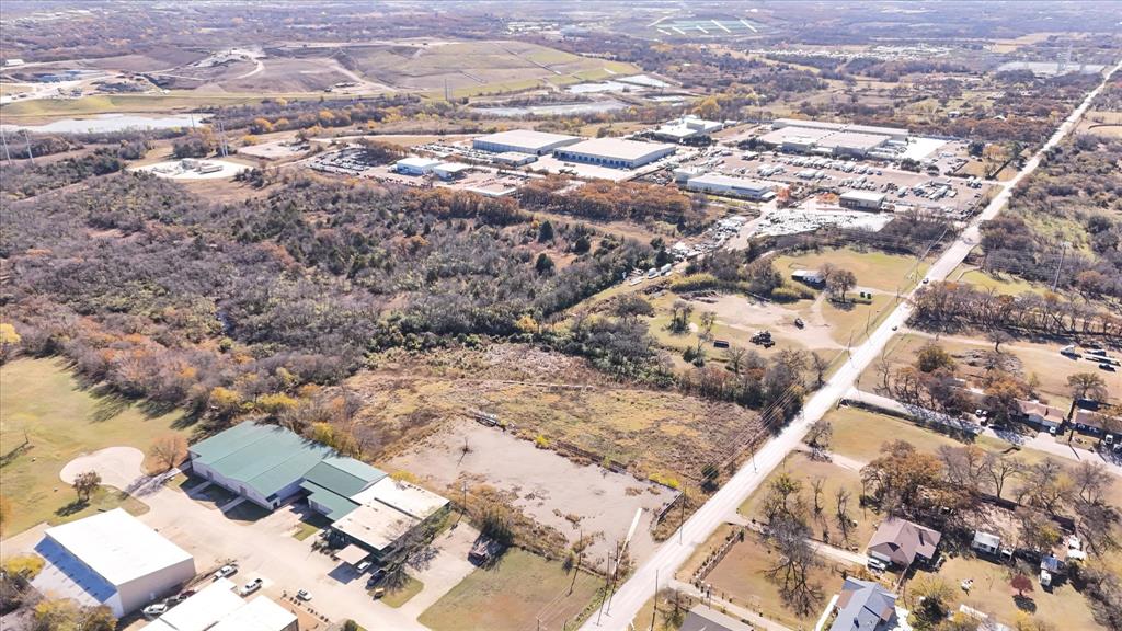 6851 Anglin Drive, Unit 1 Forest Hill, TX 76140 - Photo 11 of 16 an aerial view of residential houses with outdoor space
