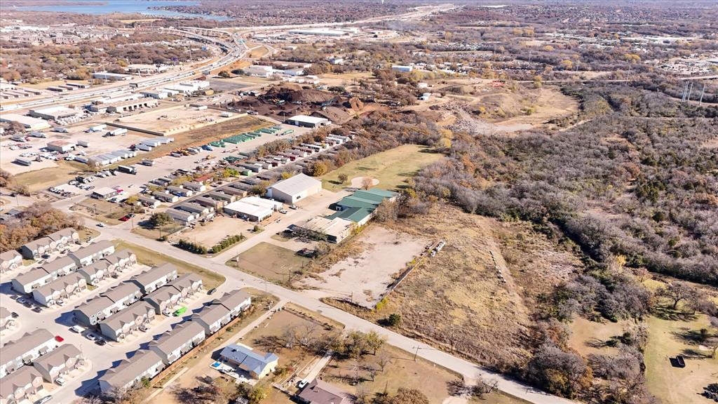 6851 Anglin Drive, Unit 1 Forest Hill, TX 76140 - Photo 13 of 16 an aerial view of residential houses with yard