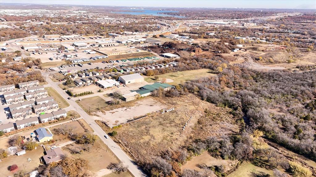 6851 Anglin Drive, Unit 1 Forest Hill, TX 76140 - Photo 14 of 16 an aerial view of residential building with parking space