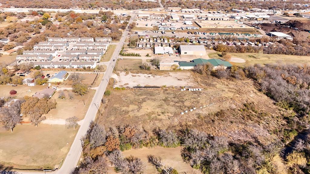 6851 Anglin Drive, Unit 1 Forest Hill, TX 76140 - Photo 15 of 16 a view of residential houses with yard