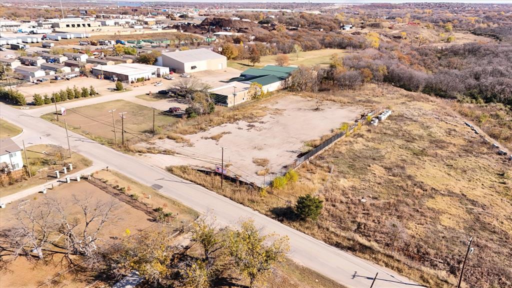 6851 Anglin Drive, Unit 1 Forest Hill, TX 76140 - Photo 2 of 16 an aerial view of residential houses with wooden fence