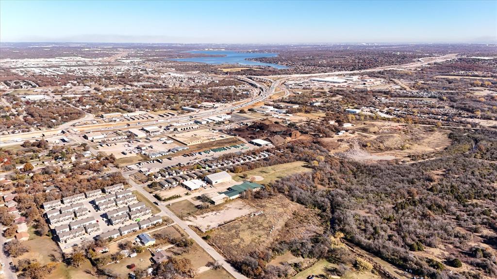 6851 Anglin Drive, Unit 1 Forest Hill, TX 76140 - Photo 4 of 16 an aerial view of residential houses with city view