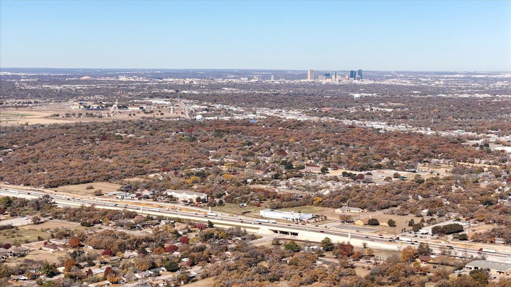 6851 Anglin Drive, Unit 1 Forest Hill, TX 76140 - Photo 5 of 16 an aerial view of residential houses with outdoor space