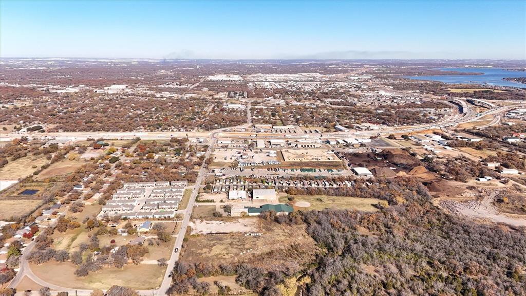 6851 Anglin Drive, Unit 1 Forest Hill, TX 76140 - Photo 7 of 16 an aerial view of residential houses with outdoor space