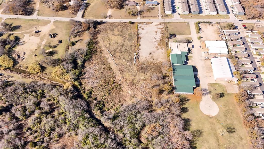 6851 Anglin Drive, Unit 1 Forest Hill, TX 76140 - Photo 9 of 16 a bathroom with a shower curtain