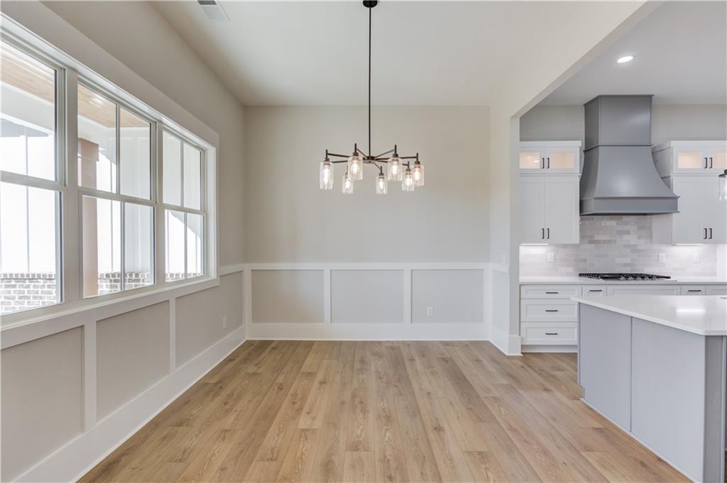 30 River Overlook Way Jefferson, GA 30549 - Photo 13 of 66 a kitchen with wooden floor and a window