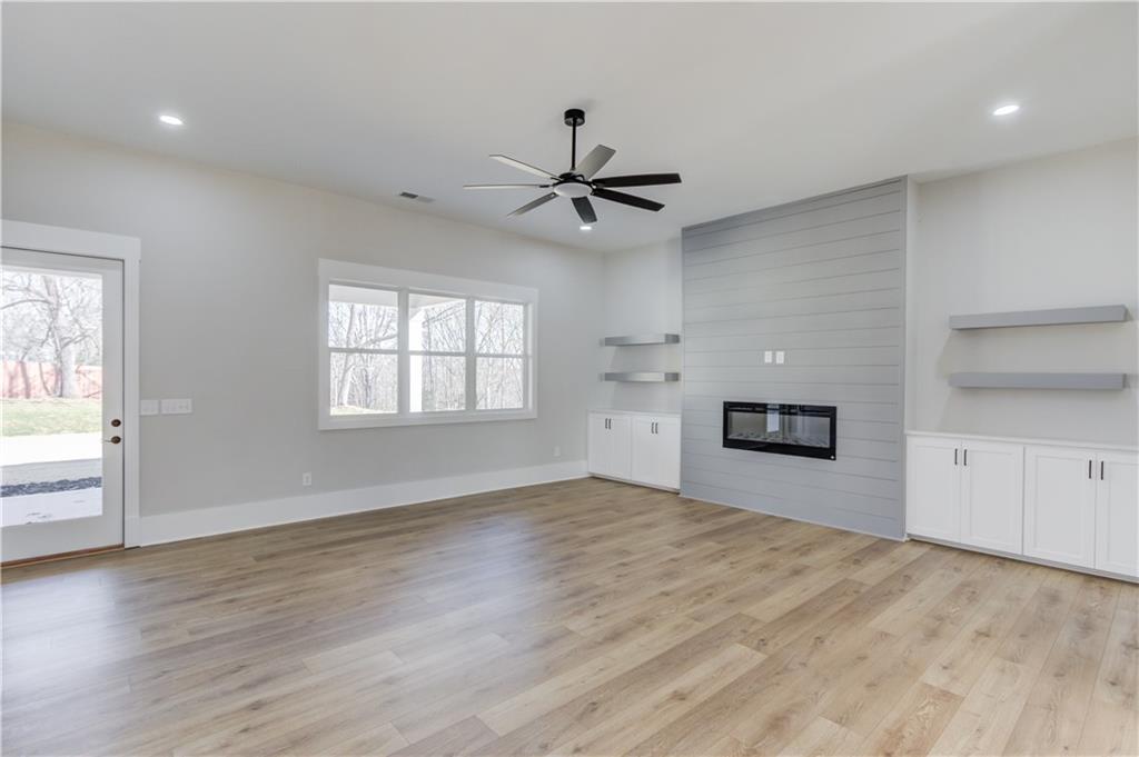 30 River Overlook Way Jefferson, GA 30549 - Photo 15 of 66 wooden floor in an empty room with a window