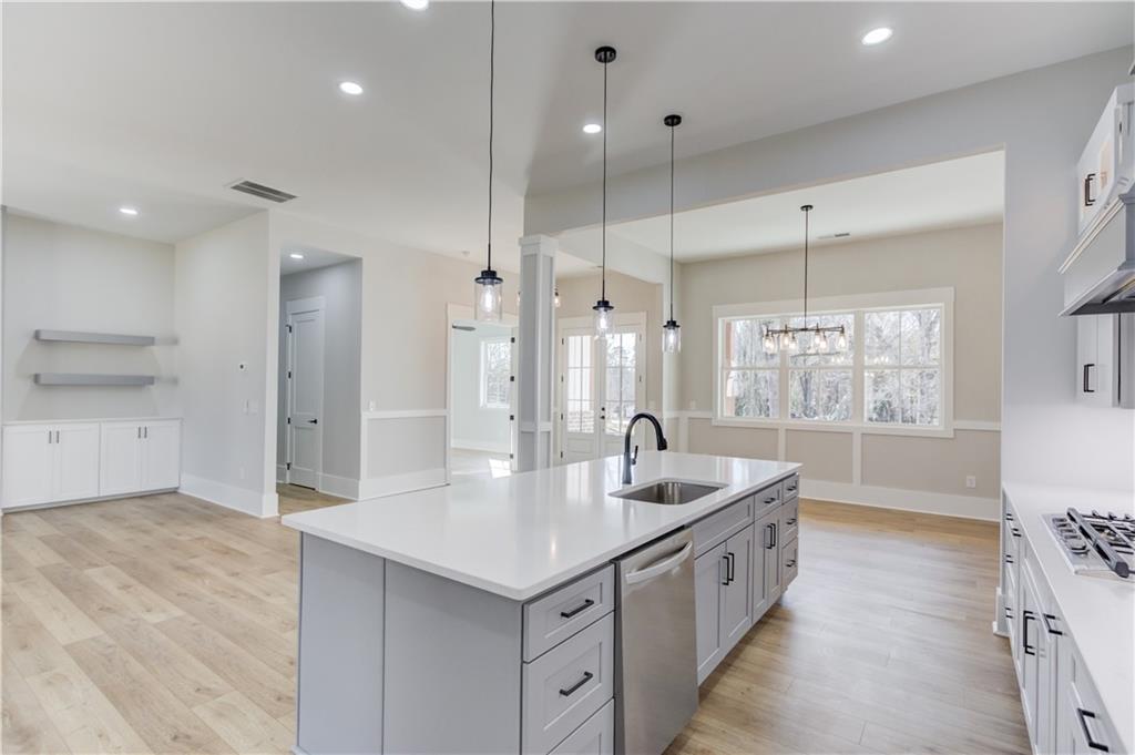 30 River Overlook Way Jefferson, GA 30549 - Photo 25 of 66 a kitchen with a sink a counter top space stainless steel appliances and a window