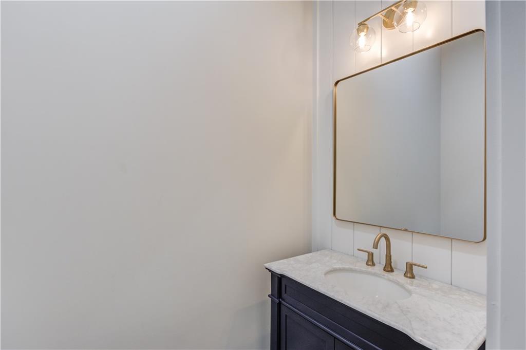 30 River Overlook Way Jefferson, GA 30549 - Photo 27 of 66 a bathroom with a sink and a mirror
