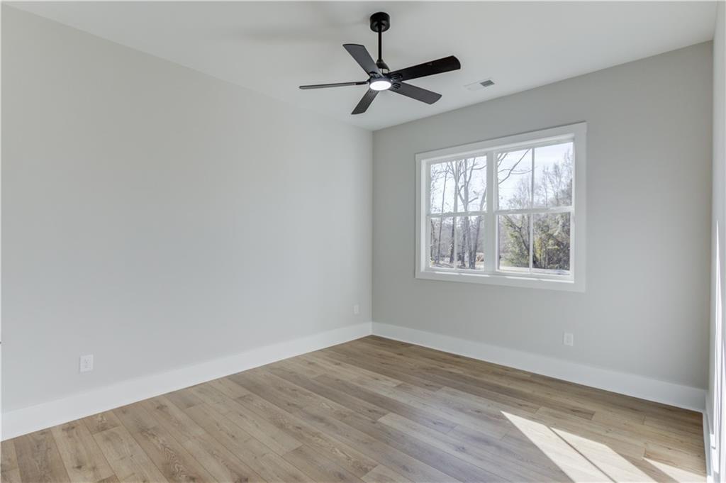 30 River Overlook Way Jefferson, GA 30549 - Photo 35 of 66 a view of a room with a window and a ceiling fan