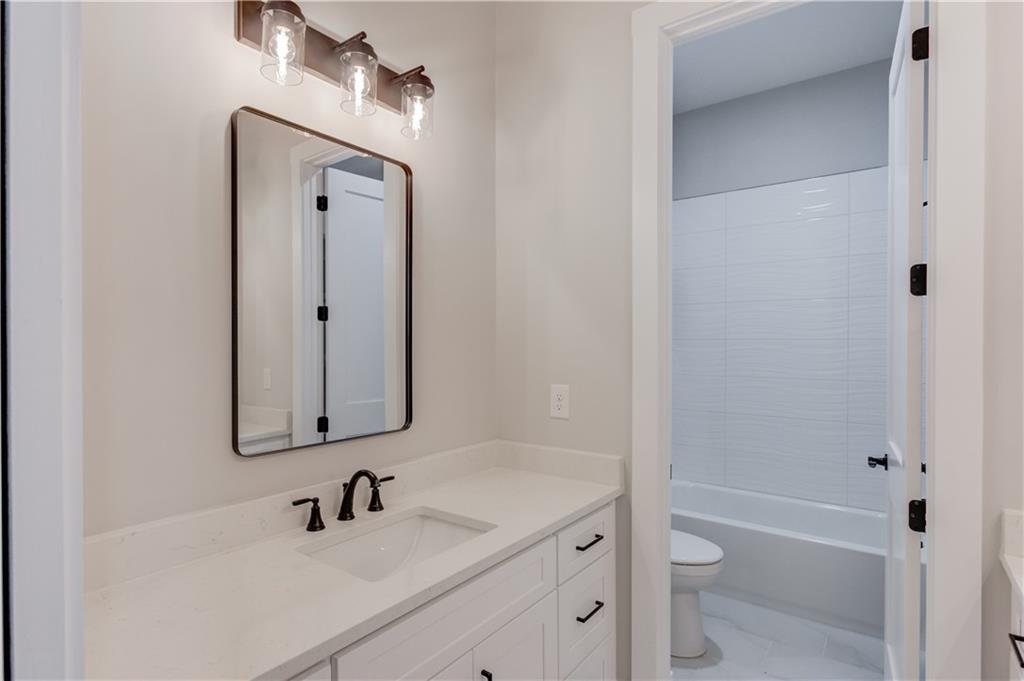 30 River Overlook Way Jefferson, GA 30549 - Photo 37 of 66 a bathroom with a sink toilet and shower