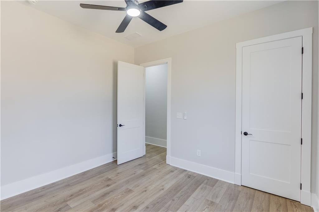30 River Overlook Way Jefferson, GA 30549 - Photo 41 of 66 a view of an empty room with wooden floor