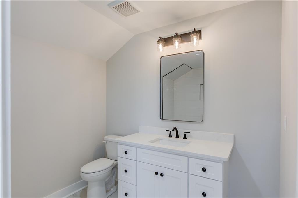 30 River Overlook Way Jefferson, GA 30549 - Photo 51 of 66 a bathroom with a toilet sink and mirror