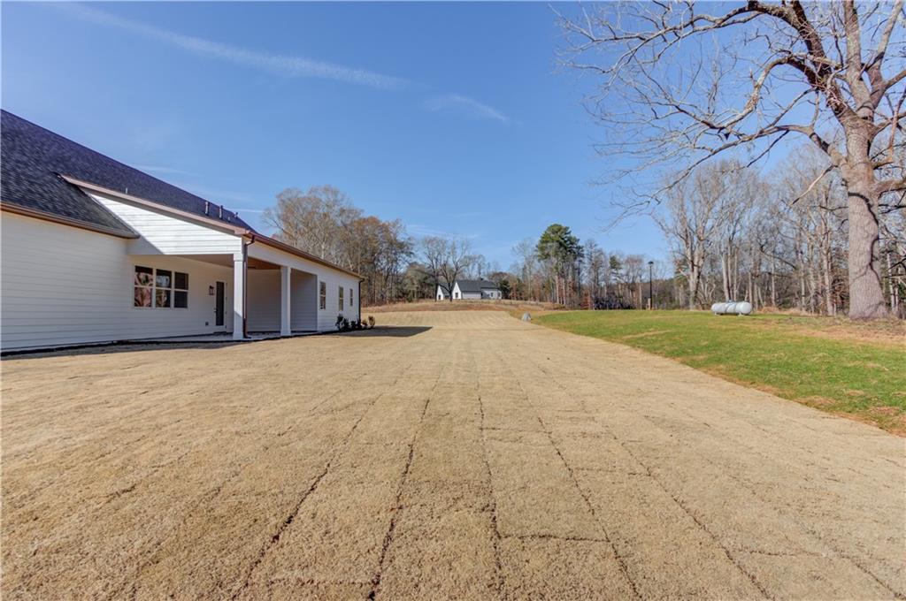 30 River Overlook Way Jefferson, GA 30549 - Photo 57 of 66 a view of a house with a yard